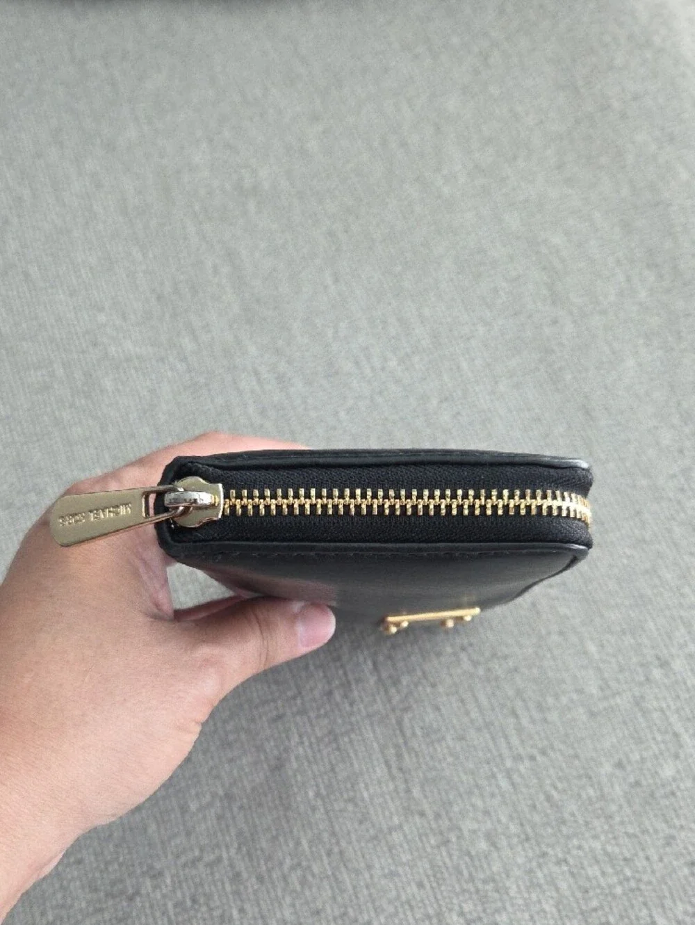 Michael Kors Black Leather Zip-Around Wallet with Gold Plaque